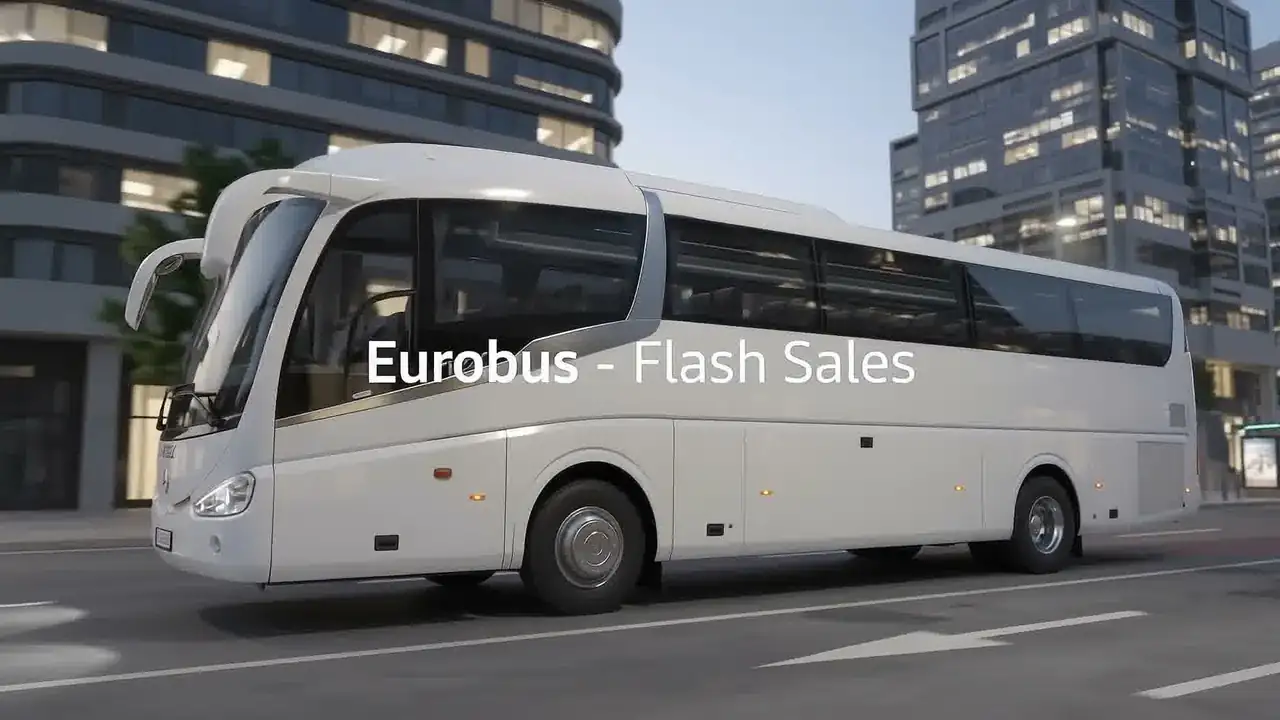 White Eurobus touring coach on a city street